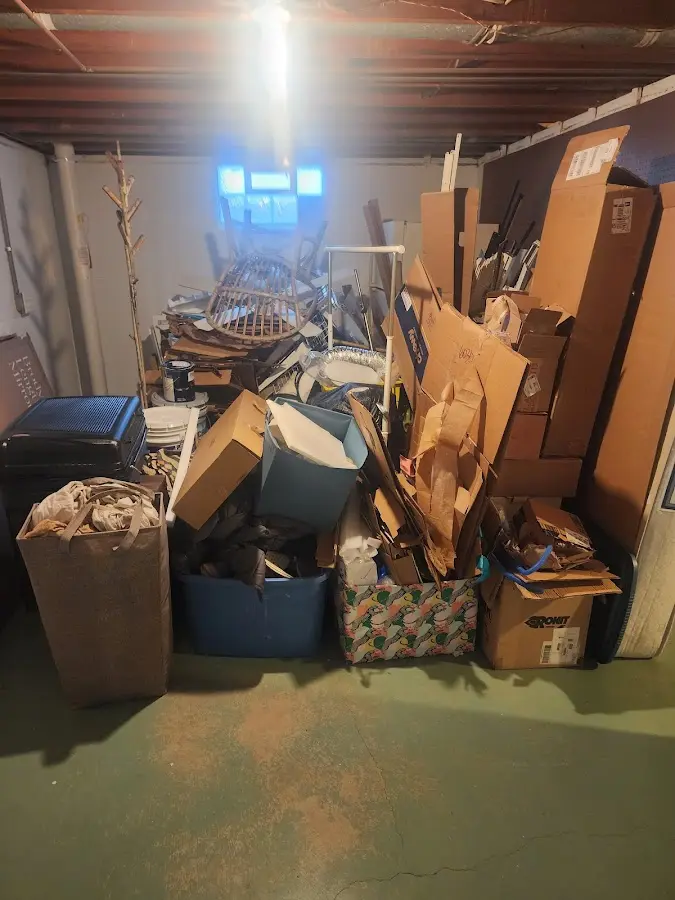 Roll-off dumpster container at job site for 2 Yard Dumpster Rental in Bloomington